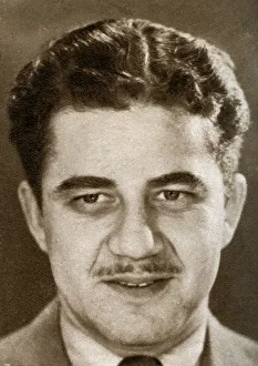 Irving Asher, film producer and managing director of British projects for Warner Brothers, 1933