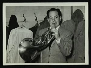 Amusing Gallery: Irving Rosenthal with a French horn, c1950s. Artist: Denis Williams