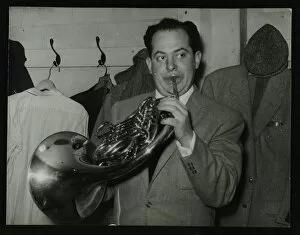 Amusing Gallery: Irving Rosenthal with a French horn, c1950s. Artist: Denis Williams