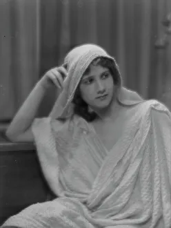Hooded Prints: Isadora Duncan dancer, portrait photograph, between 1915 and 1923. Creator: Arnold Genthe
