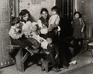 Young Girl Prints: An Italian Home Near Hull House, 1910, Printed 1920s. Creator: Lewis Wickes Hine