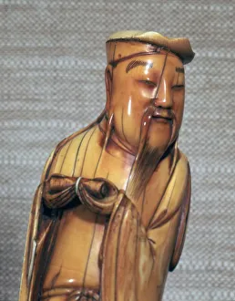 Ming Dynasty Prints: Ivory Chinese figurine of Chang Kuo Lao, 17th century