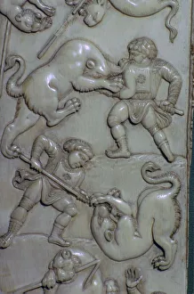 Detail from an ivory diptych of men fighting lions, 6th century