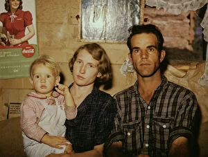 Farmworker Collection: Jack Whinery, homesteader, with his wife and the youngest of his five... Pie Town, New Mexico