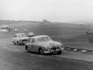 Saloon Prints: Jaguar 3. 4 Mark1 at Brands Hatch 1957. Creator: Unknown