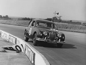 Jaguar 3.4 Mark1 J.W. Dean at Silverstone 1961. Creator: Unknown