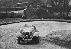 Bend Gallery: Jaguar SS 100 of CJ Gibson competing in the RAC Rally, 1939. Artist: Bill Brunell