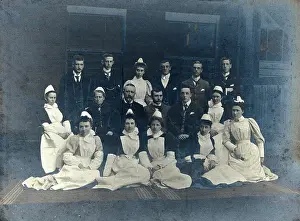 Employee Prints: James Rutherford Morison with his staff: seven men and nine women, c1900. Creator: Unknown