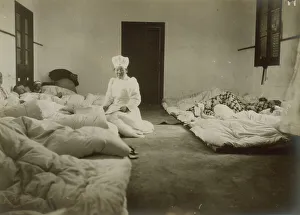 South Korea Prints: Japanese Red Cross nurses at Chemulpo attending Russian soldiers wounded in battle of Feb