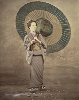 Teal Prints: Japanese woman holding a large parasol, 1868-1880. Creator: Felice Beato