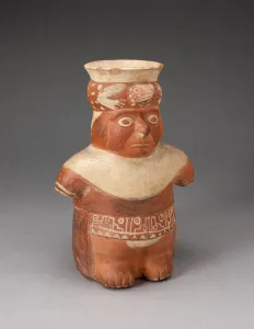 Waistband Prints: Jar in the Form of a Figure with Patterned Waistband and Lizard Headdress