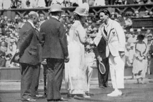 Congratulation Prints: Jean Borotra receives his medal from Queen Mary on centre court