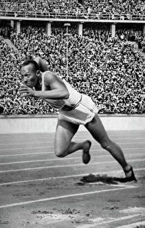 Spectator Collection: Jesse Owens at the start of the 200 metres at the Berlin Olympic Games, 1936