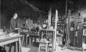 Electron Gallery: JJ Thomson, British physicist, at work in the Cavendish Laboratory, Cambridge