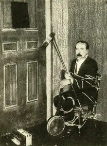 Newnes Prints: John Nevil Maskelyne performs a spirit cabinet illusion, c1910. Creator: Unknown