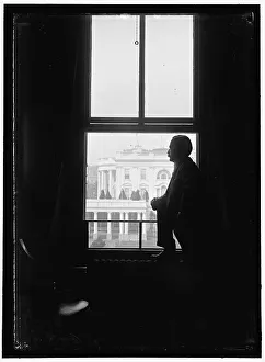 Background Prints: John Skelton Williams at window with White House visible in background