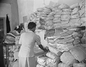 Parcel Gallery: Johnnie Lews Chinese laundry on Monday morning, Washington, D.C. 1942. Creator: Gordon Parks