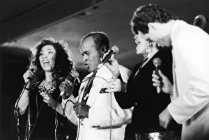 Jon Hendricks and three unidentified singers, c1998. Creator: Brian Foskett