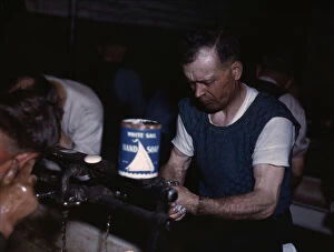 Joseph Klesken washing up after a day's work...Proviso yards of the C & NW RR, Chicago, Ill., 1943