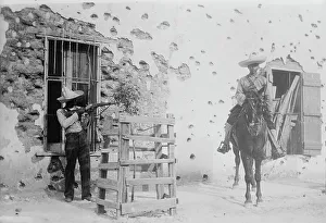 Mud Brick Prints: Juarez, Adobe house riddled, between c1910 and c1915. Creator: Bain News Service