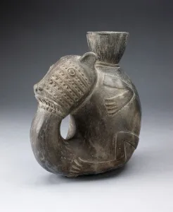 Chimu Gallery: Jug in the Form of a Curled Animal, with Tail in Mouth, Possibly a Feline, A.D. 1000 / 1400