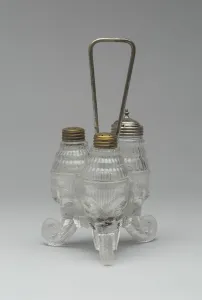 Jumbo/Elephant pattern cruet stand with three bottles, 1883/5 Jumbo/Elephant pattern cruet stand with three bottles, 1883/5