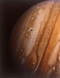 Planet Gallery: Jupiter, Io and Europa from 20 million kilometres. Creator: NASA
