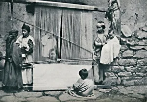 Loom Gallery: Kabyle weavers and native loom, Northern Algeria, 1912. Artist: Legrand