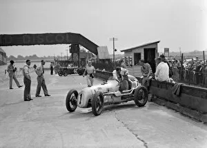 Alan Gallery: Kay Petre in an Austin 7 works team racing car, Brooklands, 1937. Artist: Bill Brunell
