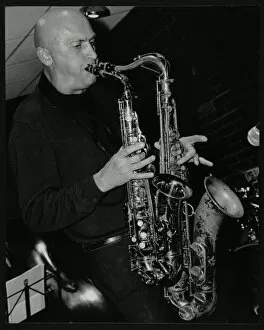 Alto Saxophonist Collection: Kelvin Christiane playing two saxophones at The Fairway, Welwyn Garden City, Hertfordshire, 2002