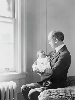 Group Portraits Prints: Kennerley, Mr. and Norman baby, portrait photograph, 1925 July 22. Creator: Arnold Genthe