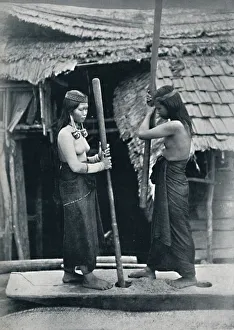 Hose Prints: Kenyah women pounding rice, Sarawak, 1902. Artist: Dr Charles Hose