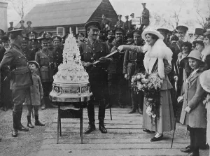 A khaki wedding: Cutting the wedding cake with the bridegrooms sword, 1915 A khaki wedding: Cutting the wedding cake with the bridegrooms sword, 1915