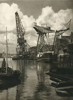 Kiel - Giant floating crane of the Germania Shipbuilding Yards, 1931. Artist: Kurt Hielscher