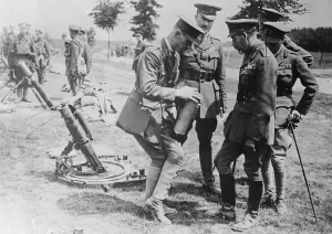 Risky Business Prints: King Geo. studies trench bombs, 7 Jul 1917. Creator: Bain News Service