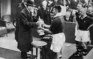 Winning Gallery: King George V presenting the FA Cup, Wembley Stadium, London, c1923-1936 (1937).Artist: Fox