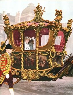 King George V and Queen Mary in the historic State Coach, c1935