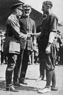 Images Dated 3rd September 2007: King George V receiving a American soldier who had been playing baseball, c 1910s (1936)