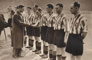 King George VI and Queen Elizabeth attend the Association Football cup final, 1937