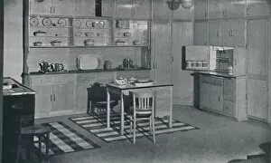 Timber Gallery: A kitchen arranged and equipped by Heal & Son, Ltd. of London, 1942