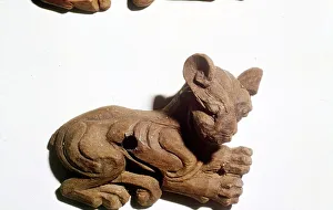 Kitten Carved wooden bridle-plate from Pazyryk, Altai Mountains Kitten Carved wooden bridle-plate from Pazyryk, Altai Mountains