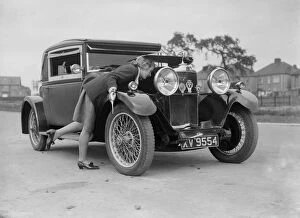 Engine Gallery: Kitty Brunell looking under the bonnet of a Talbot 14 / 45 sportsmans coupe, c1928
