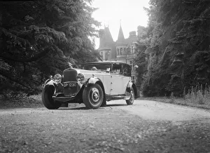 Kitty Brunell road testing a 1931 Delage D8, Wykehurst Place, Bolney, Sussex. Artist: Bill Brunell