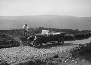 Kitty Brunell road testing a Riley 9 WD tourer, c1930. Artist: Bill Brunell