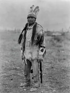 A Klamath in costume, c1923. Creator: Edward Sheriff Curtis
