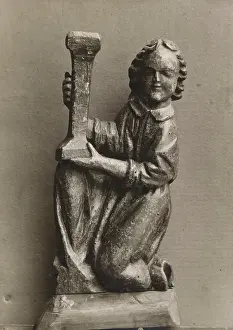 Silver Bromide Print Prints: Kneeling figure with a candlestick, (1925-1930). Creator: Unknown