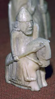 Norse Gallery: A Knight - The Lewis Chessmen, (Norwegian?), c1150-c1200