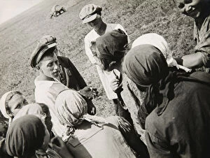 Collective Farm Gallery: A Kolkhoz brigade taking a break, USSR, 1931