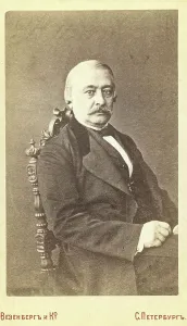 Kraevskii, Andrei Aleksandrovich, half-length portrait, seated, facing... between 1880 and 1886. Creator: Unknown