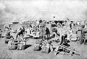 La Turquie Succombe; L'inspection des selles des chameaux employes aux transports, 1918. Creator: Unknown